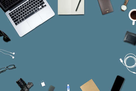 Top view, Flat lay style, Travel set, Working desk, computer, laptop, smart phone, coffee, mug, glasses, notebook and a lot of things on pastel color background with clipping path.の写真素材
