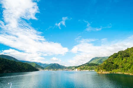 Beautiful landscape of blue ocean and City of Picton among the green nature.の写真素材