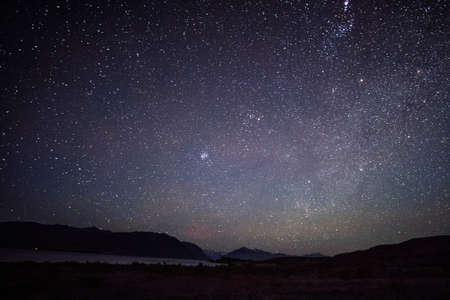 Long exposure, High ISO shot, Starlight overlake Tekapo and Mout Cook after sunset.