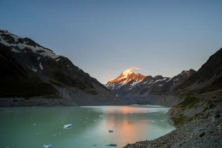 Beautiful scene of Mt Cook before the sunset with Glacier lake and blue sky, Hook Valley Track, South Island, New Zealandの写真素材