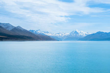 Beautiful scene of Mt Cookbeside the lake with blue sky and clouod in summer. New Zealandの写真素材