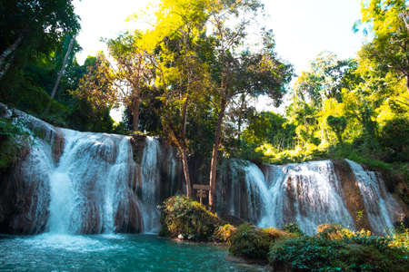 Than sawan Waterfall, Payao, Thailand, Normal shot, Beautiful green waterfall in the nature at sunset.の写真素材