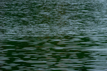 Wave on the green lake, Pattern backround.の写真素材