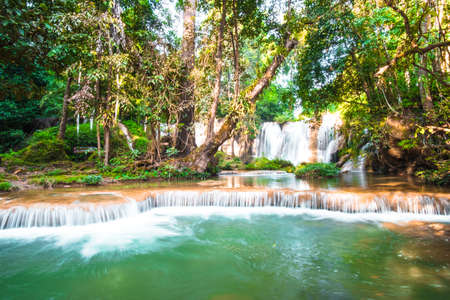 Than sawan Waterfall, Payao, Thailand, Long explosure shot, Beautiful green waterfall in the nature at sunset.の写真素材