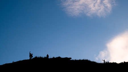 Silhouette shot, Group of tourist on high mountain, Phu chi fa, Chaingrai, Thailandの写真素材