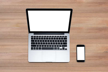 Top view, Travel and working desk concept, Technology things on wooden with beautiful texture background with clipping path.の写真素材