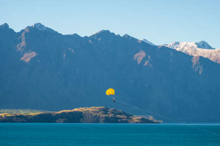 Parasailing adventure on the lake at Queenstown.の写真素材
