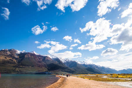 Beautiful landscape of Alps mountain and lake on a sunny day with blue sky.の写真素材