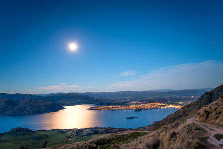 Nightscape View of Wanaka lake. View from Roys peak track. Full moon night.の写真素材