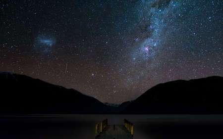 Amazing Starry night at Lake Rotoiti. Reflection of the Milky way and galaxy on the lake. Nelson...