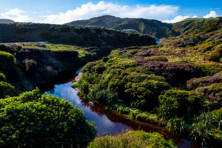 Beautiful landscape of the mountain and stream with blue sky and cloud.の写真素材