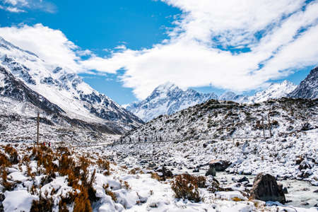 Beautiful view of Hooker Valley track covered with white snow. Mount Cook National Park.の写真素材