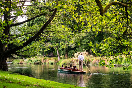 People are enjoing on the boat on the river in Botanic garden..の写真素材