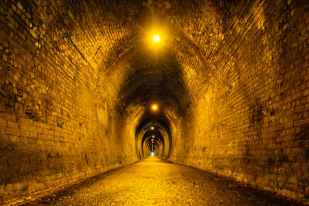 Old brick tunnel. A walkway used to be a railway before.の写真素材