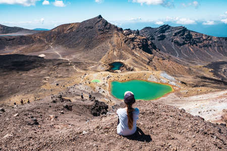 New Zealand, North Island, People enjoying the beautiful Landscape view of Tongariro Crossing track on a beautiful day with blue sky..の写真素材