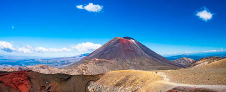 Panorama Landscape view of a beautiful of Tongariro Crossing track on a beautiful day with blue sky, North Island, New Zealand..の写真素材