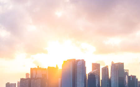 2019 March 1st, Singapore, Marina Barrage - View of the buildings at sunset with golden light through the clouds..のeditorial素材