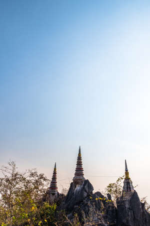 Beautiful view of the temple and stupa on the cliff. Wat Phrachomklao Rachanusorn, Lampang, Thailand.の写真素材