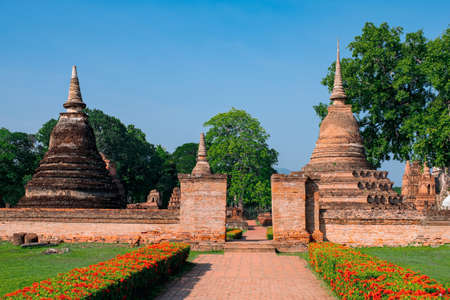 Buddha statue, Stupa, and Pagoda in the historical park., Sukhothai, Thailand.の写真素材