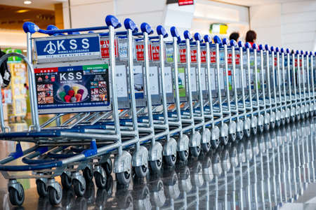 Stack trolley line on the floor in Taoyuan International Airport, Taipei, Taiwan. 2019, Sep 30th.のeditorial素材