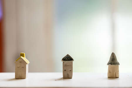 wooden house for sale on whiteの写真素材