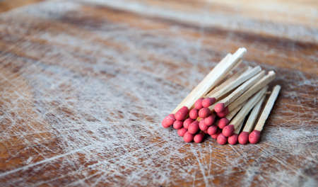 Matches on wooden tableの写真素材