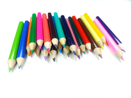 Beautifully arranged colored pencils on a white background.の写真素材