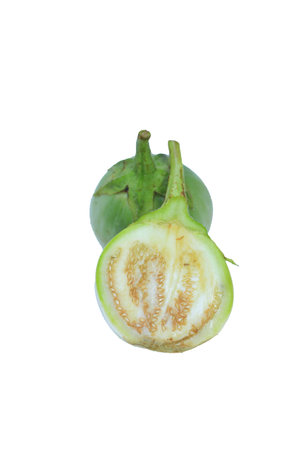 Thai eggplant, cut in half  Isolated with clipping path on a white background.の写真素材