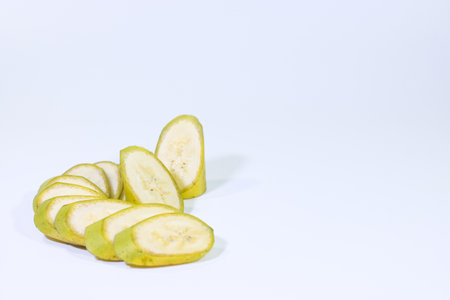 Sliced Bananas on a White Backgroundの写真素材