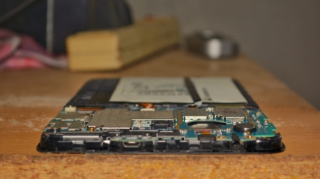 The damaged tablet technician must remove the component for inspection. Panel and parts within the...