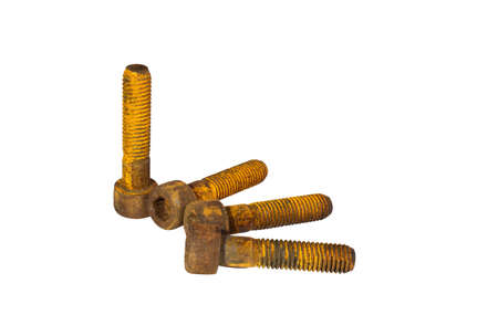 Old and rusty socket head screws stacked together on white background.の写真素材