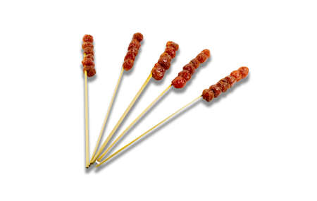 Sweet and sour gooseberry is skewed with bamboo. On a white background. Clipping path.の写真素材