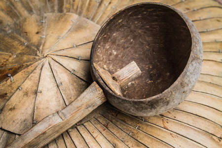 Drinking cup made from a coconut shellの写真素材