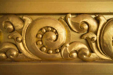 Walls made of gold inside Wat Chaimongkol Roi Et hold on Thailand.のeditorial素材