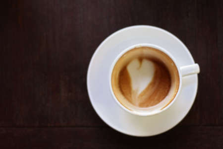 Drinking a cup of coffee Four heart shaped latte art Donegal blur.の写真素材