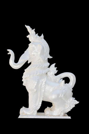 The beautiful stucco lion on black background.の写真素材