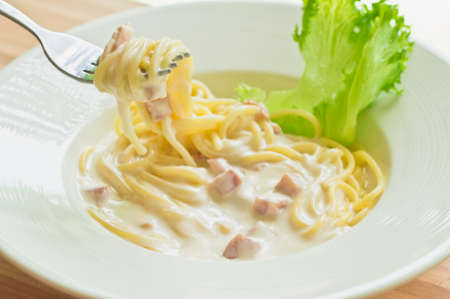 Spaghetti Carbonara with bacon and cheeseの写真素材