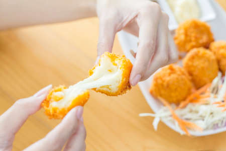 Catch cheese ballの写真素材