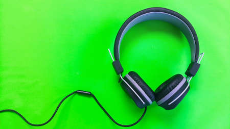 Earphome on  green backgroundの写真素材