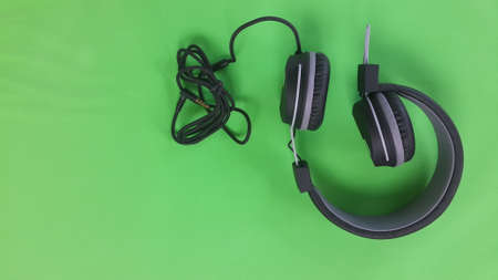 Headphone on green backgroundの写真素材
