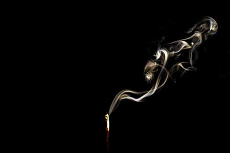 Blur Incense Stick with Smoke on Black in black and white abstract background.の写真素材
