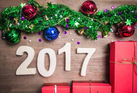 Christmas symbols colorful stars and colored bell surface texture Happy New Year 2017 holiday.