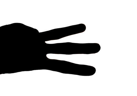 Black E-shaped hand isolated white backdrop.の写真素材