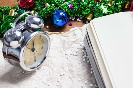 Clock and notebook opening bell colorful concept backgroundの写真素材