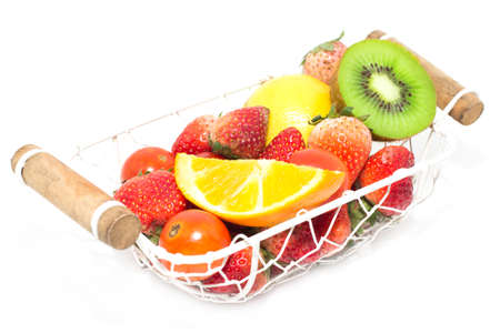 Mixed fruits in basket isolated on white backgroundの写真素材