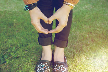 Hand shaped head and light sunsetの写真素材