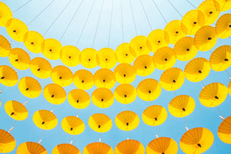 Yellow umbrella texture background.の写真素材