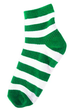 White and green sock isolated white background.の写真素材