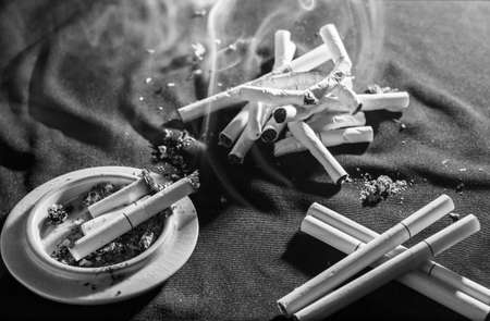 Wite black cigarettes concept abstain from smoking.の写真素材