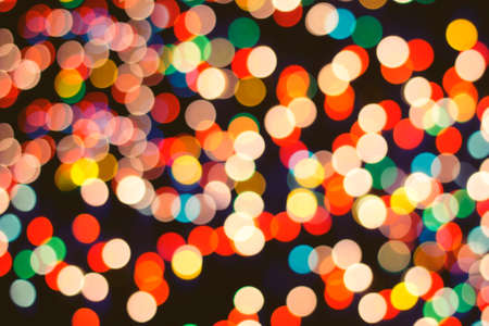 Blur bokeh light colorful in holiday night Christmas abstract background.の写真素材